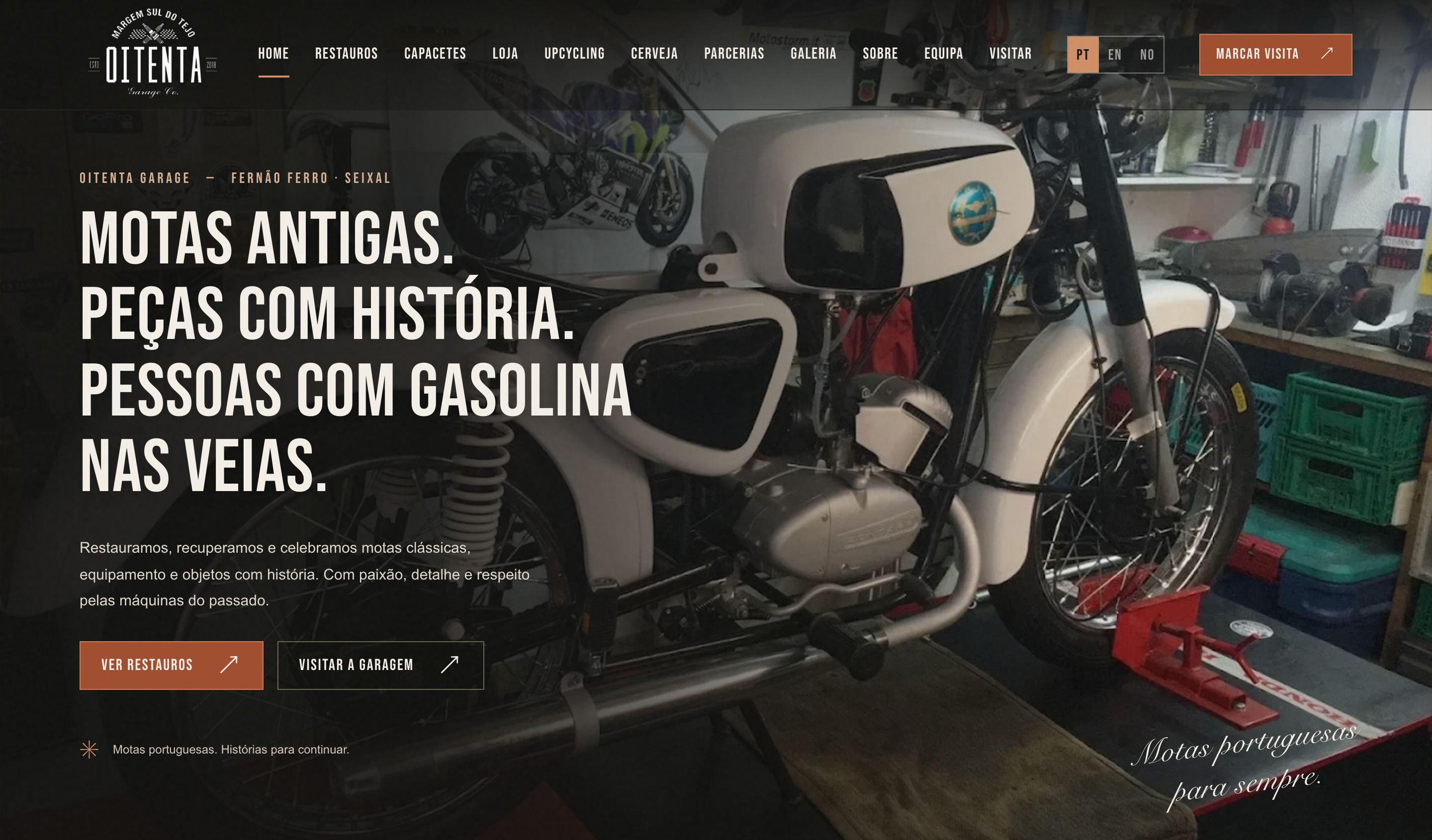 Oitenta Garage website home page on a laptop